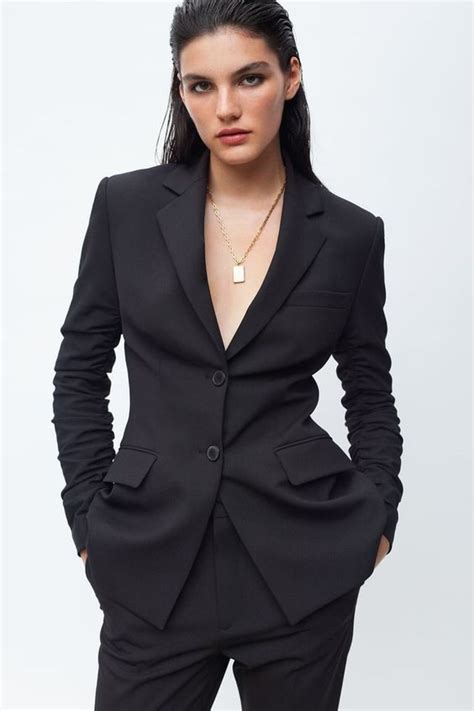 woman in black suit